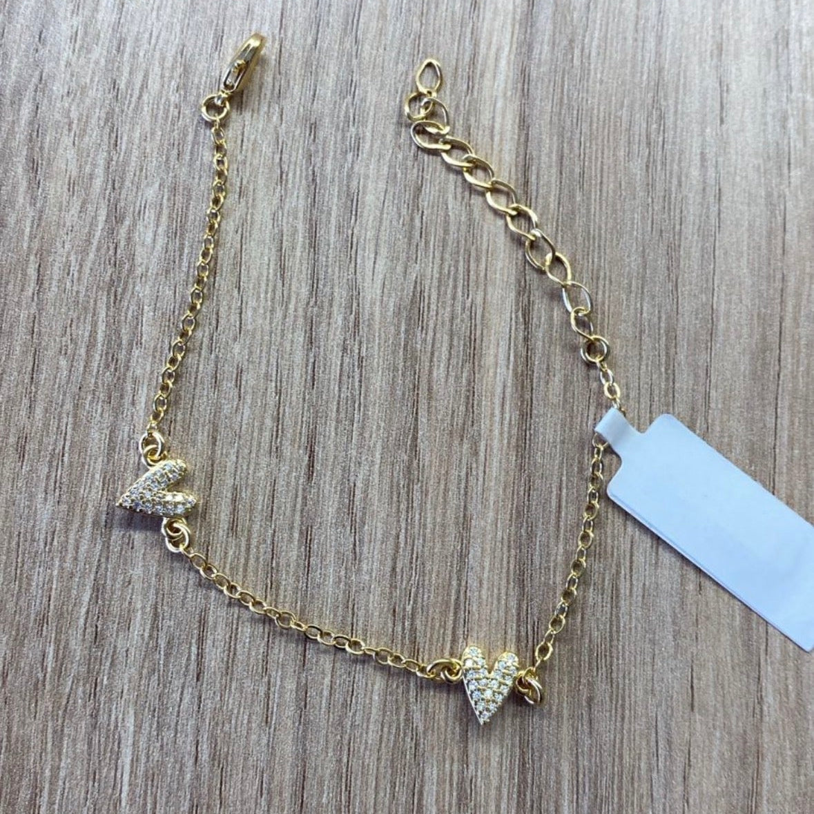 Pulseira Duplo Coração Cravejado Banhada a Ouro